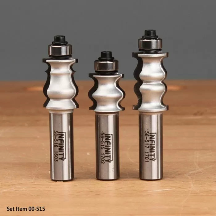 Set of three decorative edge router bits on a wooden surface, labeled with Infinity text.