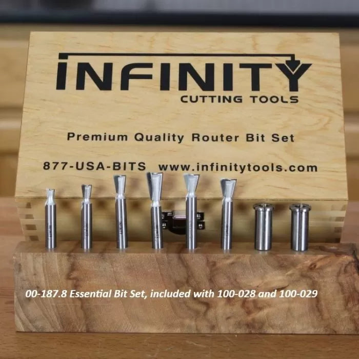 Woodworking router bit set displayed in wooden case with various premium cutting bits.