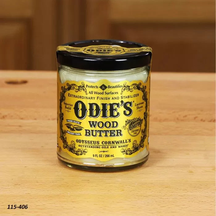 Odie's Wood Butter jar for woodworking finish and wood surface protection on wooden table.