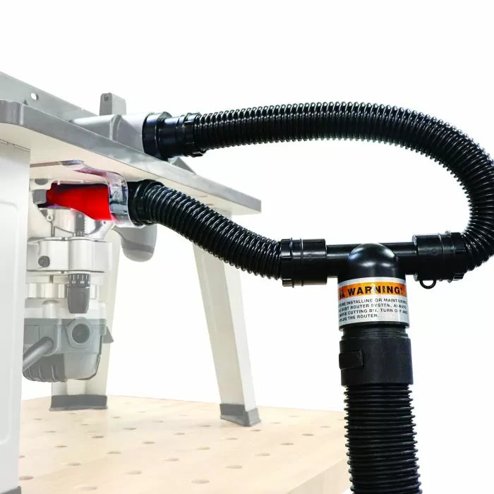 Router table dust collection kit with flexible hoses and Y-fitting attached under woodworking table