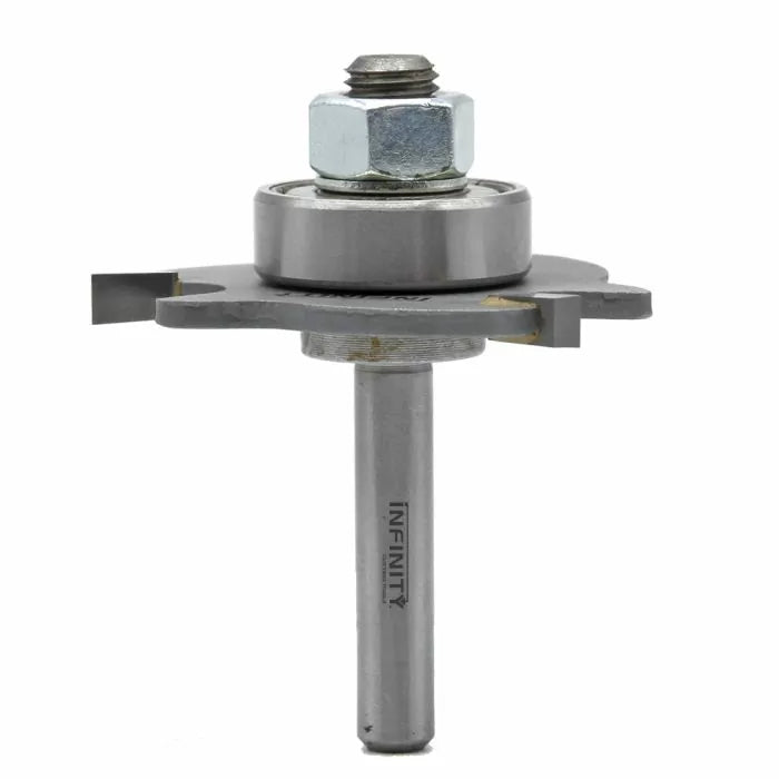 Carbide woodworking router bit with bearing and cutting blades, used for precise joinery.