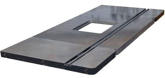 A cast iron router table top with wings on a white background.