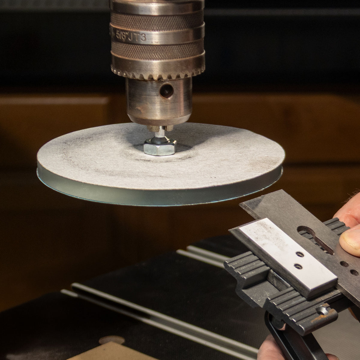 Infinity Tools glass platen in use on the Drill Press Sharpening System