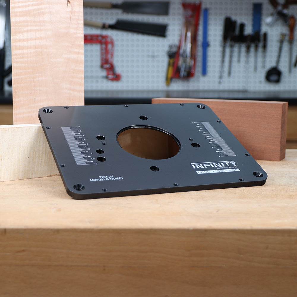 Router table insert plate with measurement markings on wooden workbench in woodworking shop