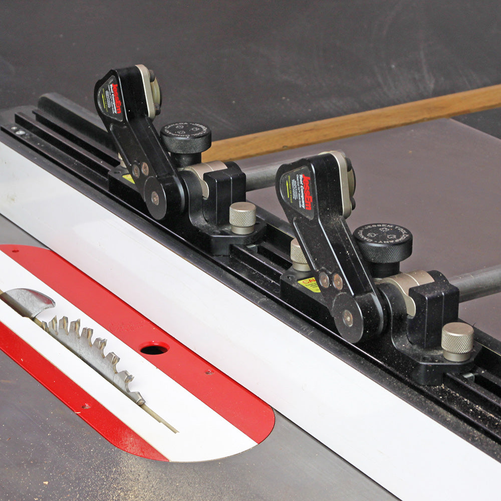 Table saw with precision featherboard jig and fence system for safe woodworking cuts