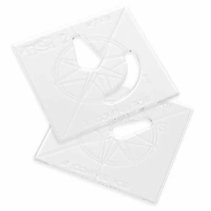 Clear acrylic woodworking router templates with geometric cutouts on white background