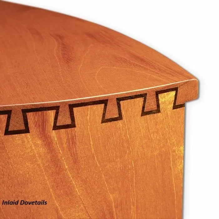 Close-up of a wood joint with precise inlaid dovetails on a light-colored wooden box