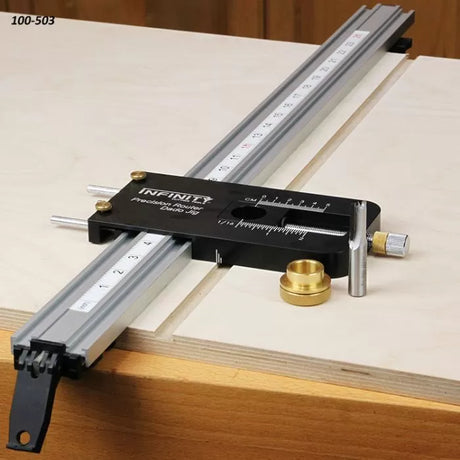 Infinity Precision Router Dado Jig with track rail clamped across a plywood panel
