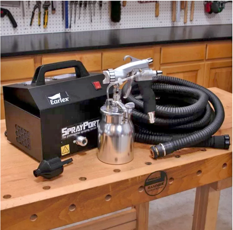 Earlex SprayPort HVLP spray system with turbine, spray gun, cup and hose on a workbench