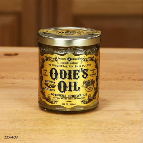 Jar of Odie's Oil universal finish and polish on a wooden workbench