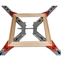 Corner clamps holding a square wooden frame at 90 degrees