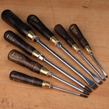 Set of wood-handled flat and Phillips screwdrivers with brass ferrules