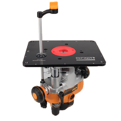 Infinity router table plate mounted on an orange Triton router