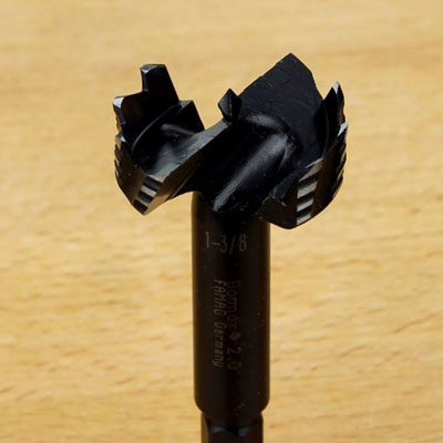 Close-up of a Bormax 2.0 Forstner bit cutting head on a wood surface