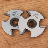 7/32 inch rail and stile woodworking cutter blades on a wooden surface