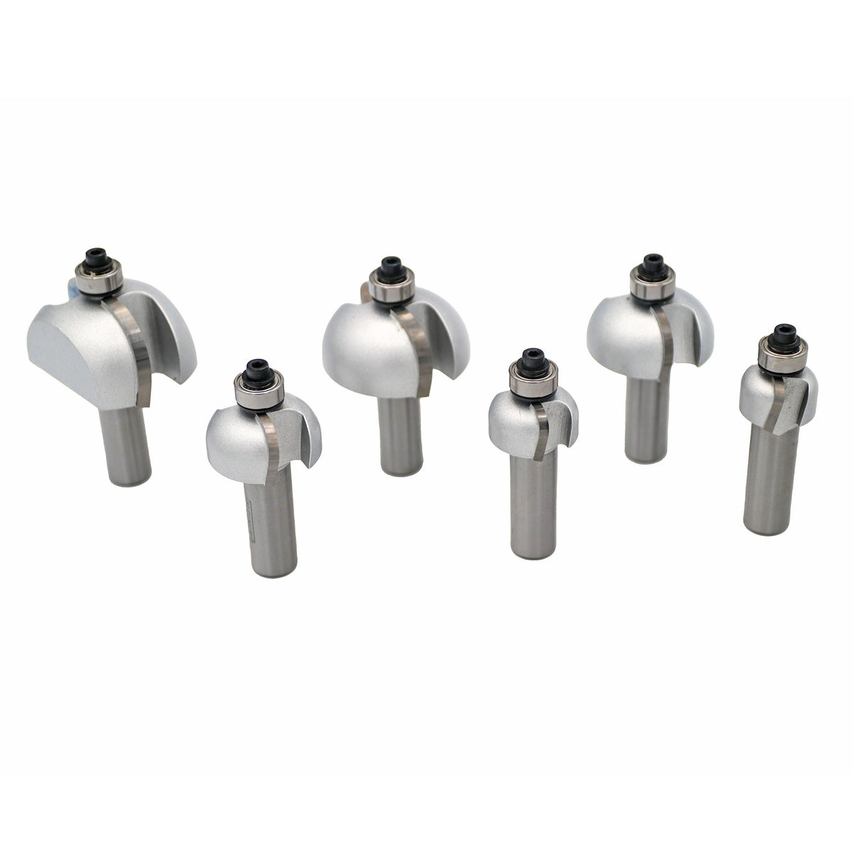 Set of six metal roundover router bits with ball bearings, displayed on white background.