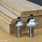 Roman ogee router bits with ball bearings shown beside decorative wood edges