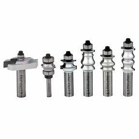 Set of six carbide woodworking router bits with ball bearing guides on white background
