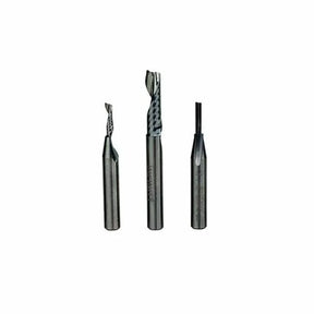 Set of three carbide router bits for woodworking on white background
