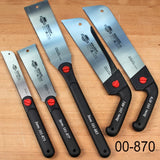 Set of five Japanese pull saws with black handles on a wood surface, ideal for woodworking.