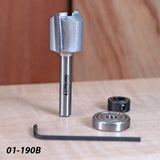 Router bit with Infinity label, two bearings, and hex key on a wooden surface