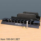Dovetail jig set with router bit and guide bushing on wooden surface for woodworking joinery.