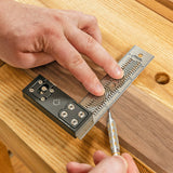 Precision woodworking square and marking gauge in use on wood surface