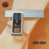 Mini combination square on woodworking project with metal ruler and wooden boards