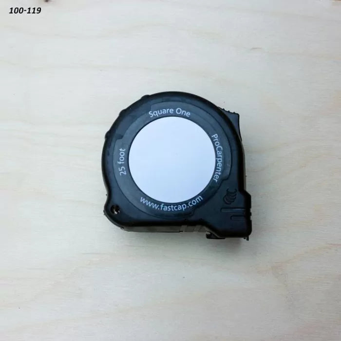 25-foot black tape measure on light wood surface, labeled ProCarpenter Square One