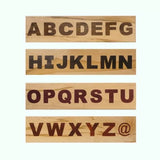 Wood letter template set with uppercase alphabet and @ symbol for woodworking projects