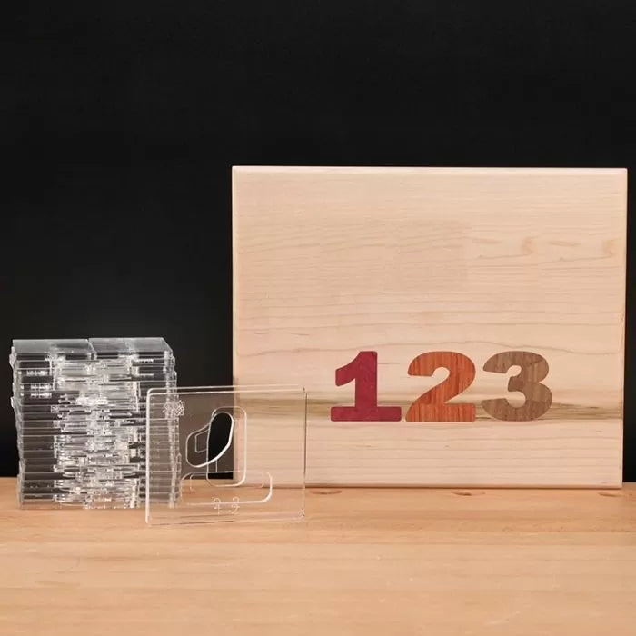Woodworking template set and wooden board with inlaid numbers for precise number routing