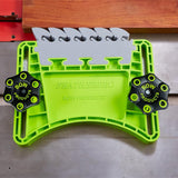 Featherboard woodworking safety tool clamped to table saw with wood piece, bright green design