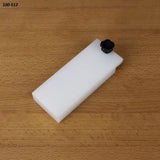 Rectangular white table saw accessory with black knob on wood surface, woodworking tool