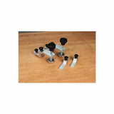 Woodworking jig hardware set with aluminum brackets and black knobs on a workbench