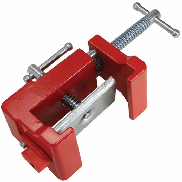 Red woodworking corner clamp for precise 90-degree angle assembly and holding