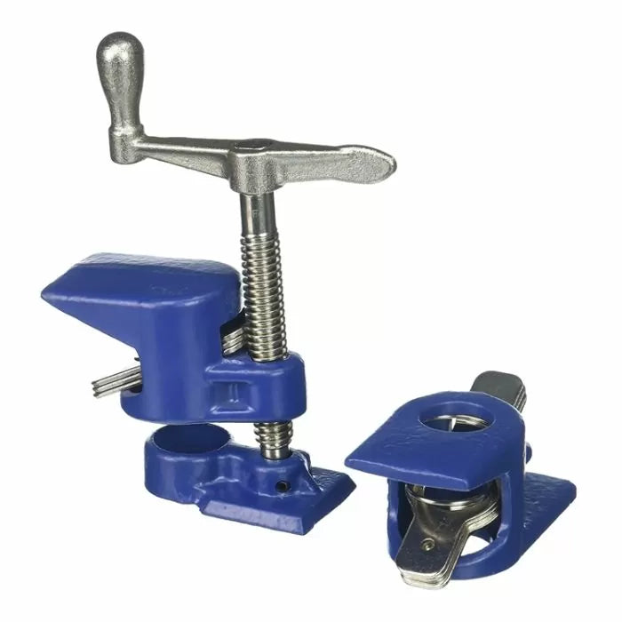 Blue woodworking bench dogs clamp set with metal screw handles on white background.