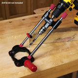Portable drill guide with adjustable base, shown on a wooden workbench for precise drilling