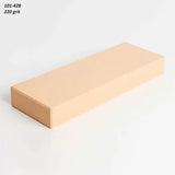 Rectangular 220 grit sharpening stone for woodworking tools on white background