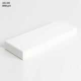 8000 grit rectangular sharpening stone for woodworking tools on white background