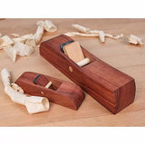 Wooden hand planes on workbench with wood shavings, woodworking tools for precision planing