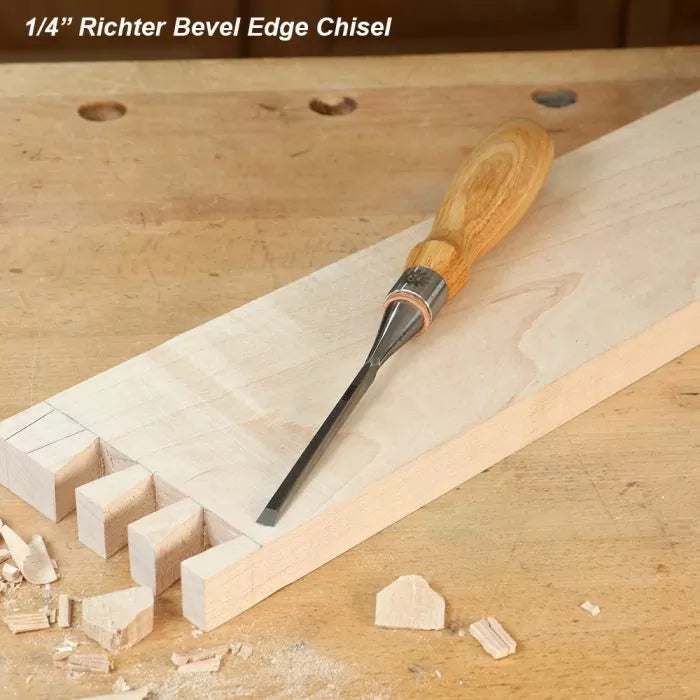 1/4-inch bevel edge chisel with wood handle on workbench, woodworking dovetail joints
