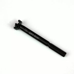 Forstner drill bit for woodworking, black shank, sharp cutting edges, isolated on white