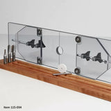 Clear acrylic router table safety guard with wood base and router bits for woodworking