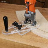 Router circle jig attached to compact router, cutting precise arc in plywood on workbench.