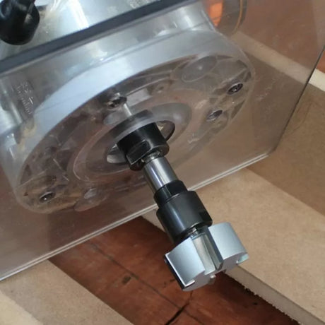 Close-up of a router fitted with a metal router bit for woodworking and joinery