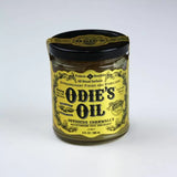 Odie's Oil wood finish and stabilizer in glass jar with yellow label for woodworking