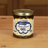 Jar of Mr. Cornwall's Super Duper Everlasting Oil on a woodworking table