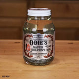 Odie's Safer Solvent jar for woodworking on a wooden table