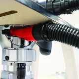 Router table dust collection system attached to a woodworking router under table