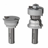 Set of two steel woodworking router bits with decorative profiles on white background